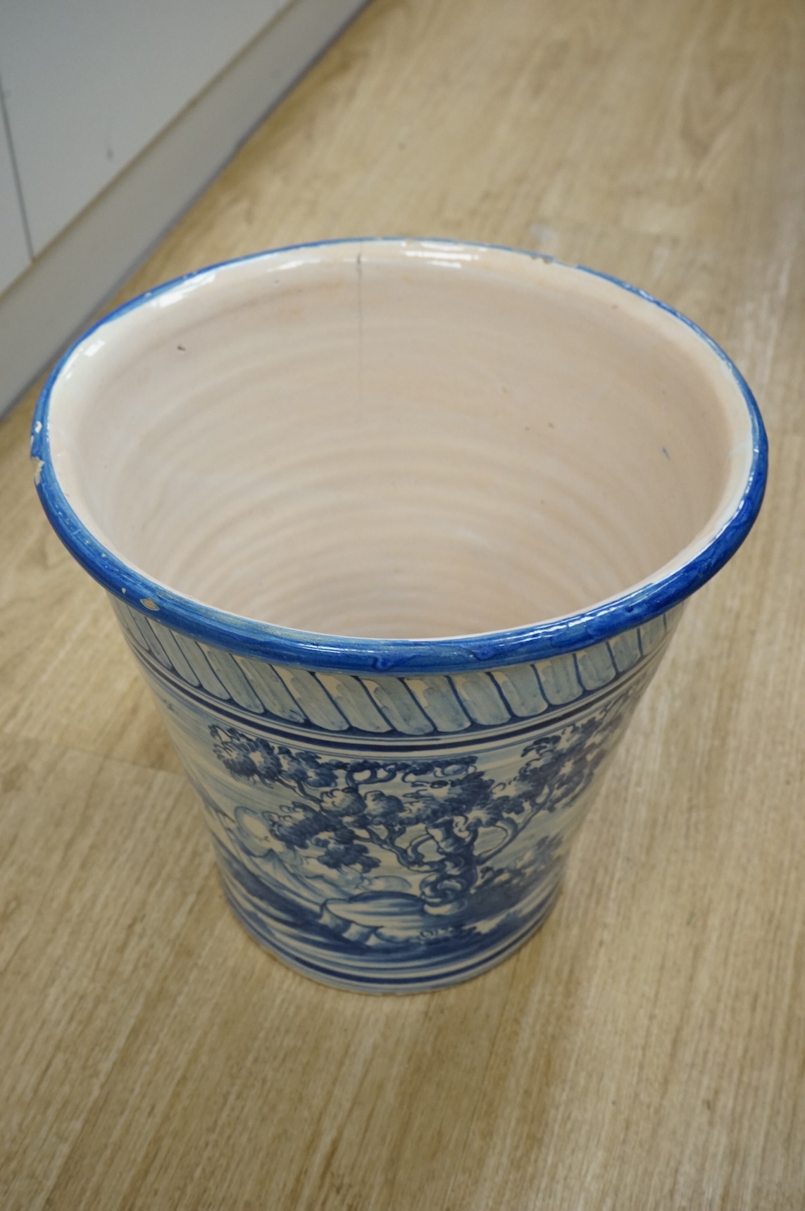 A maiolica glazed planter, 30cm high